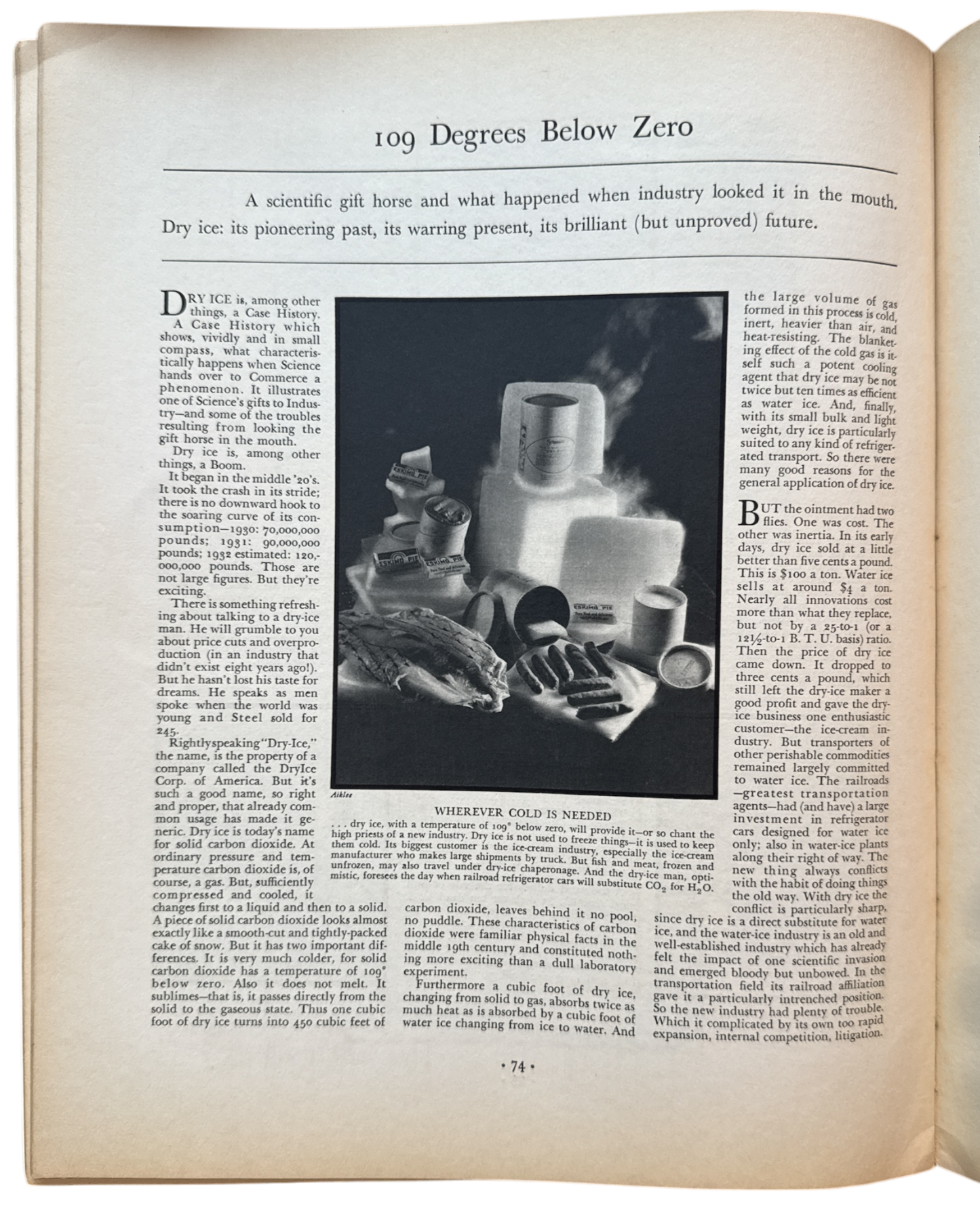 Open book with text and a black and white photograph of a scientific instrument.
