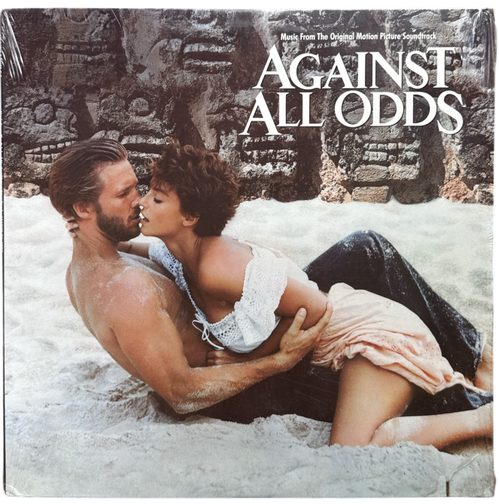 Album cover for 'Against All Odds' featuring a couple embracing in water.