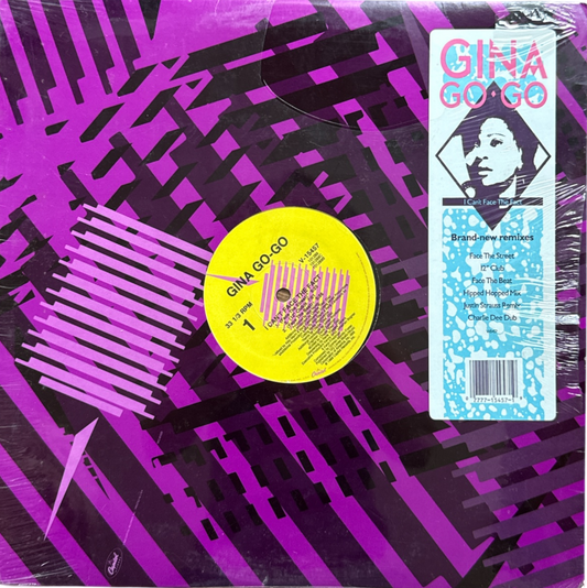 Vinyl record with a purple cover featuring a yellow label and text.